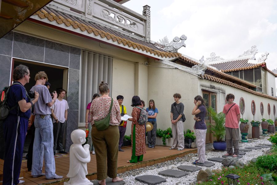 students observing street movement in Vietnam