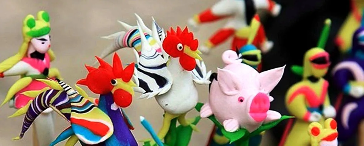 Colourful Vietnamese tò he figurines