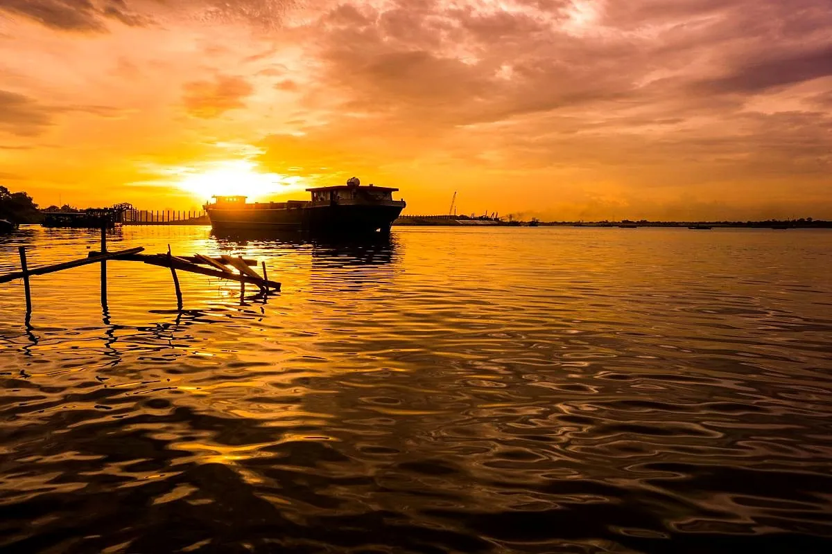 Sunset over fishing nets in the Mekong Delta