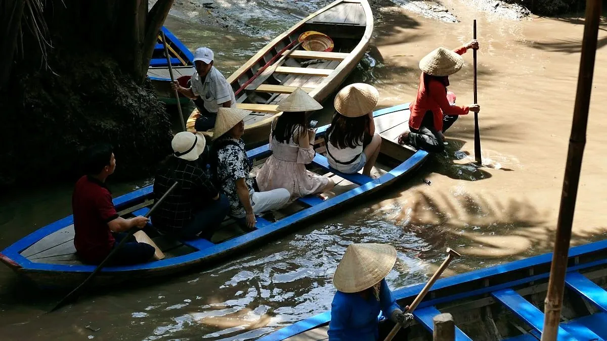 Boats and vendors at a river market in Vietnam