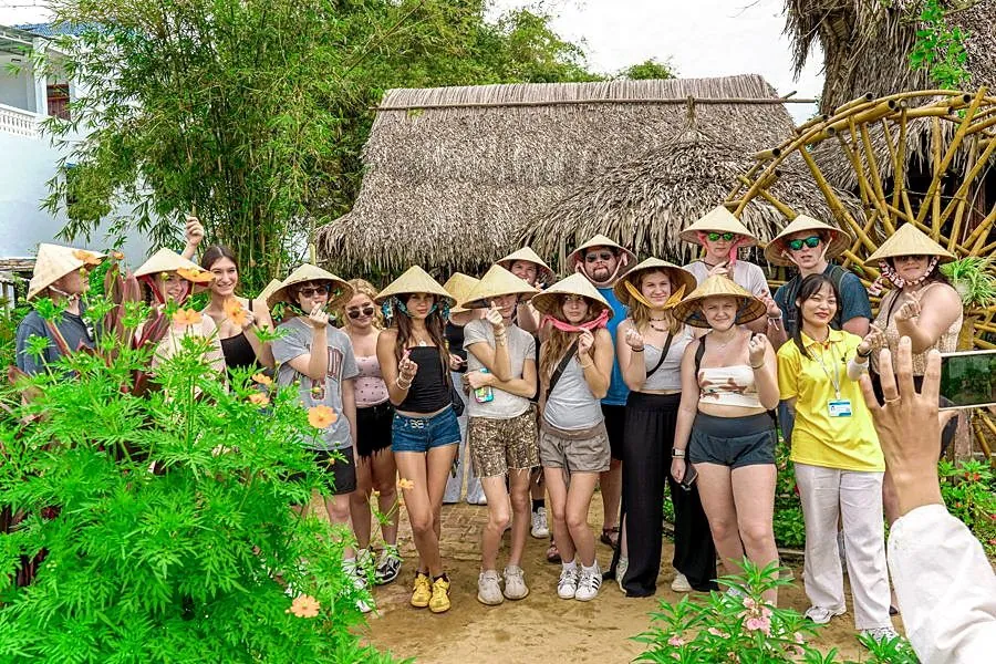 A student group visiting a rural village in Vietnam
