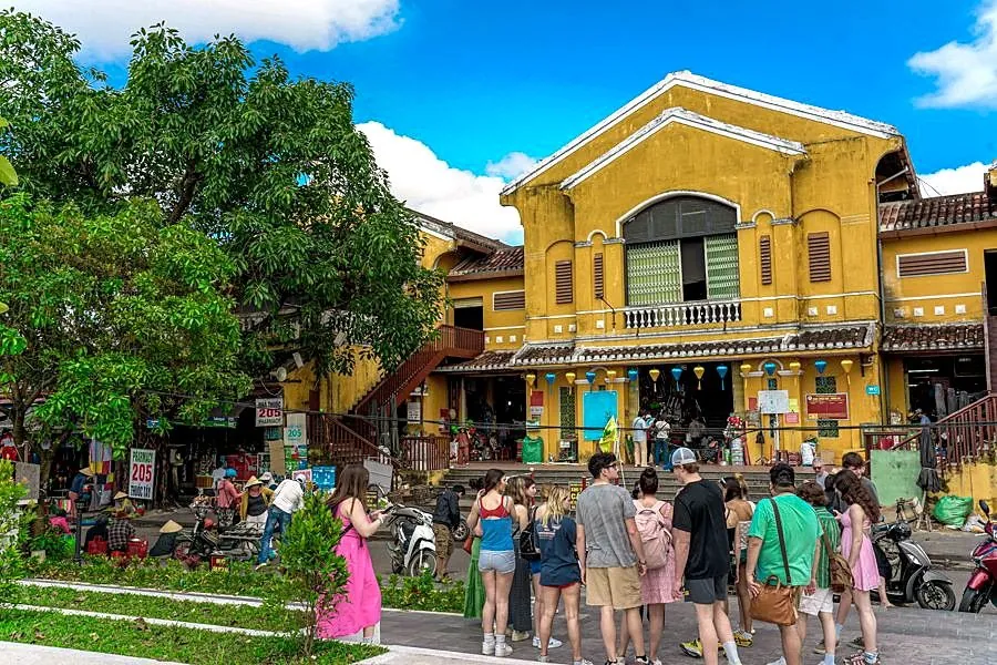 Students walking through Hoi An Old Town