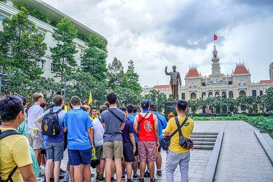 Students visiting a public monument in Ho Chi Minh City