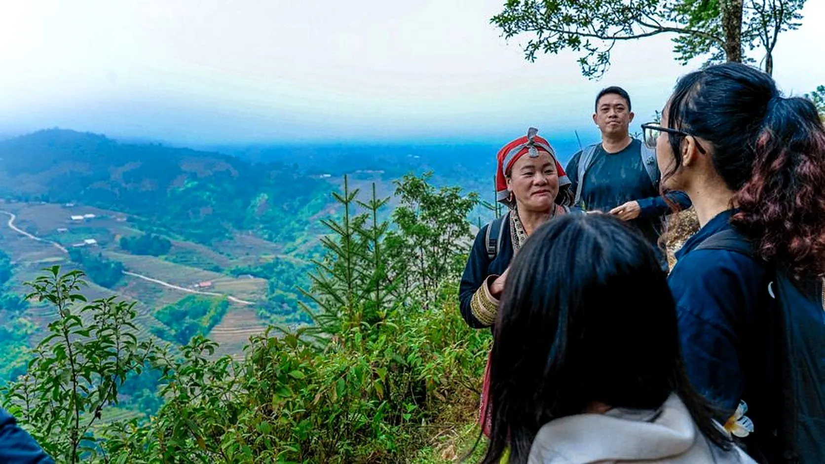 Students receiving a field briefing above the Sapa valley