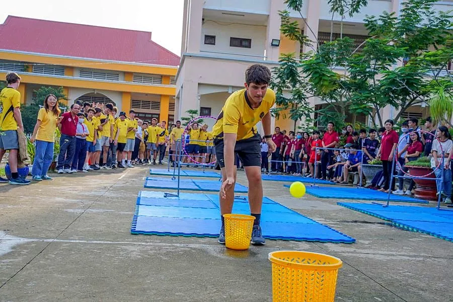 Students taking part in games with a partner school in Vietnam