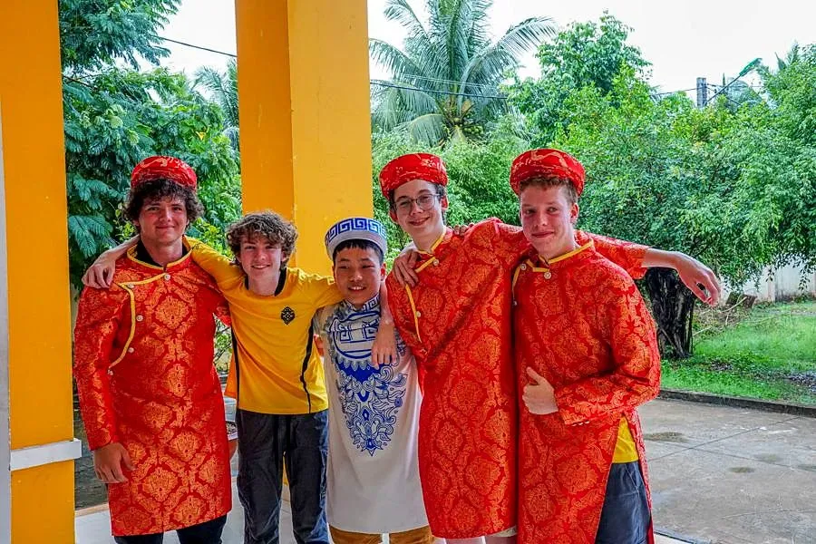 Students wearing Vietnamese traditional costumes during a school exchange